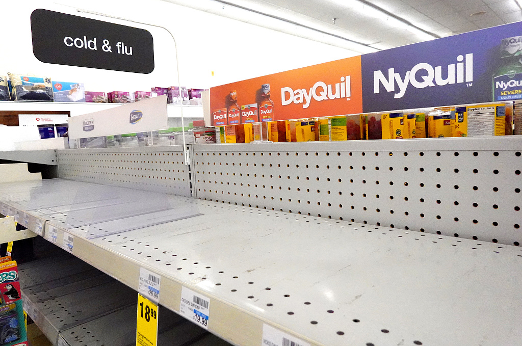 A cold and flu medicine shelf is empty in a CVS pharmacy in Burbank, California, December 6, 2022. Southern California is being hit by a wave of three viruses, the flu, COVID-19 and RSV, with the CDC classifying the state of California as having a 