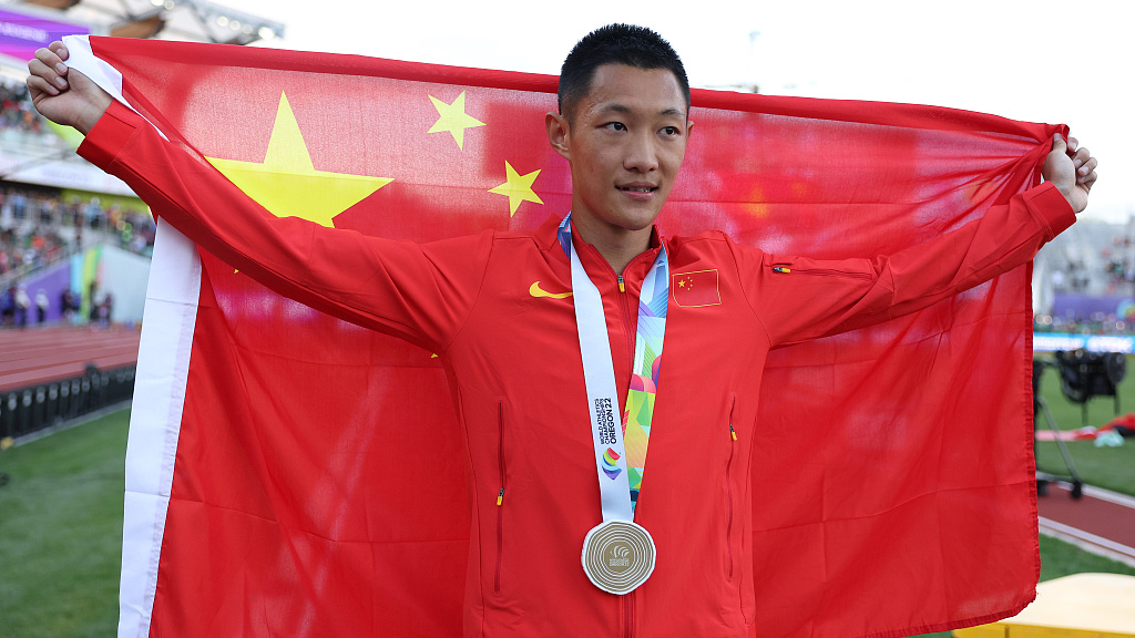 Wang Jianan of the China celebrates after winning the men's long jump gold medal at the World Athletics Championships in Eugene, Oregon, July 16, 2022. /CFP