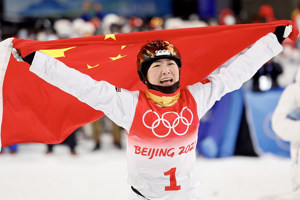 Xu Mengtao of China celebrates after winning the freestyle skiing women's aerials gold medal at the 2022 Winter Olympic Games at Genting Snow Park A & M Stadium in Zhangjiakou, north China's Hebei Province, February 14, 2022. /CFP