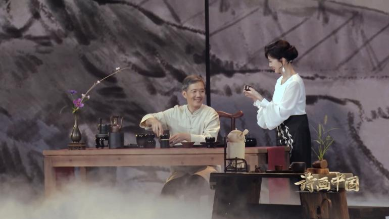 A tea-making performance by Angie Chiu and Zhang Zhifeng. /CGTN