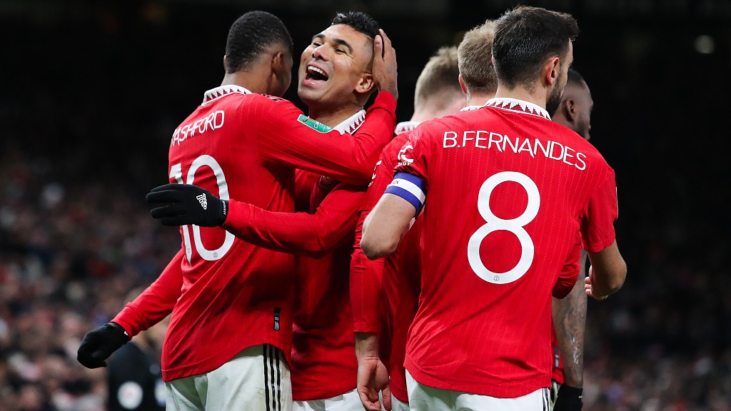Manchester United players celebrate during their League Cup clash with Burnley at Old Trafford in Manchester, England, December 21, 2022. /CFP