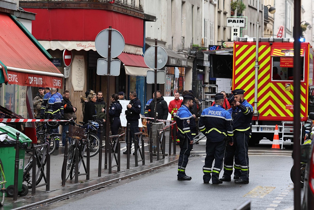 French security personnel secure the street after several shots were fired along rue d'Enghien in the 10th arrondissement, in Paris, December 23, 2022. /CFP