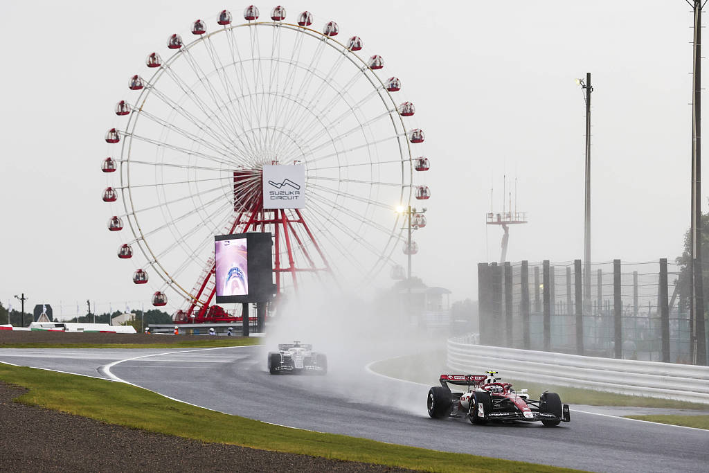 Zhou Guanyu drives his Alfa Romeo race car at Suzuka International Racing Course in Suzuka, Japan, October 9, 2022. /CFP