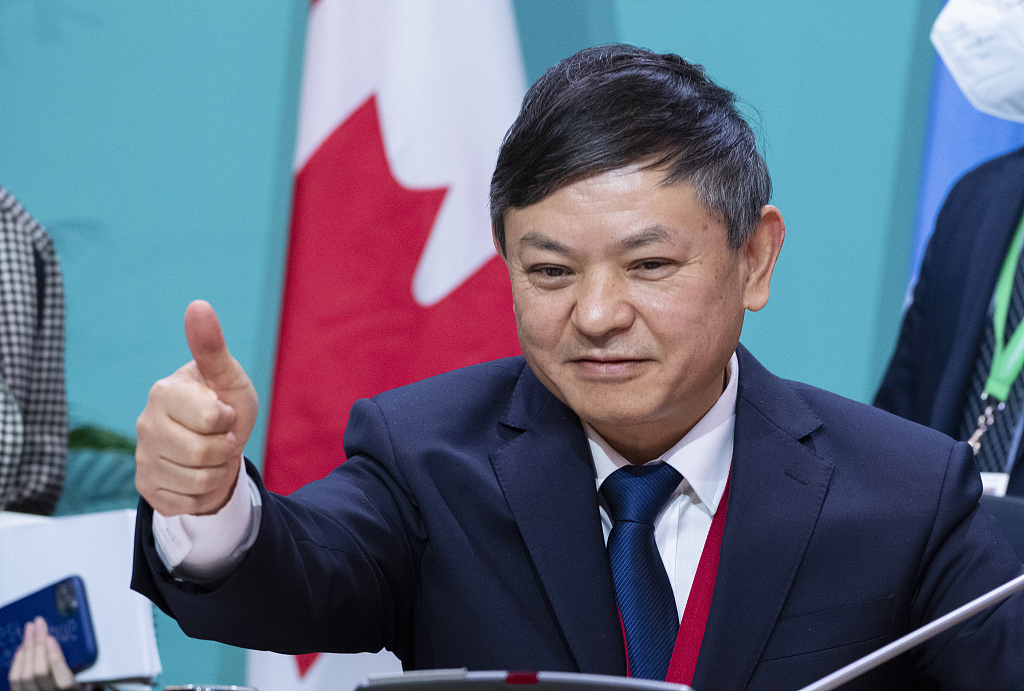 Huang Runqiu, President of the 15th Conference of the Parties (COP15) to the UN Convention on Biological Diversity, gives a thumbs up at the COP15 conference on biodiversity in Montreal, Canada, December 19, 2022. /CFP