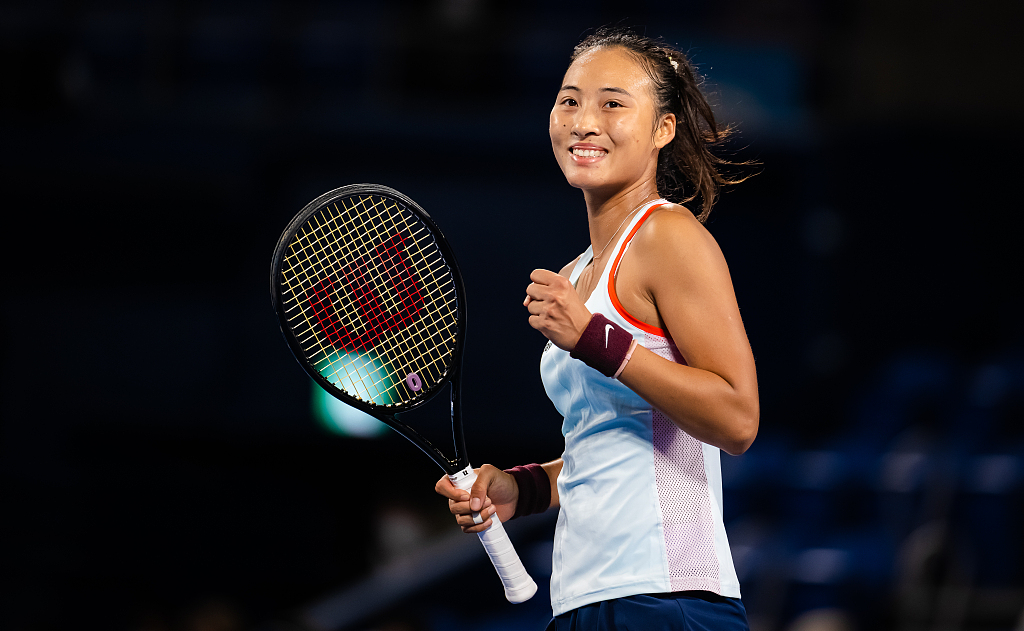 Zheng Qinwen of China celebrates after converting match point against Paula Badosa of Spain in her second round match at the Pan Pacific Open in Tokyo, Japan, September 21, 2022. /CFP