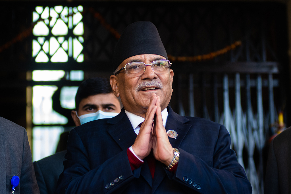 Pushpa Kamal Dahal gestures after reaching a power-sharing deal at Balkot, Nepal, December 25, 2022. /CFP