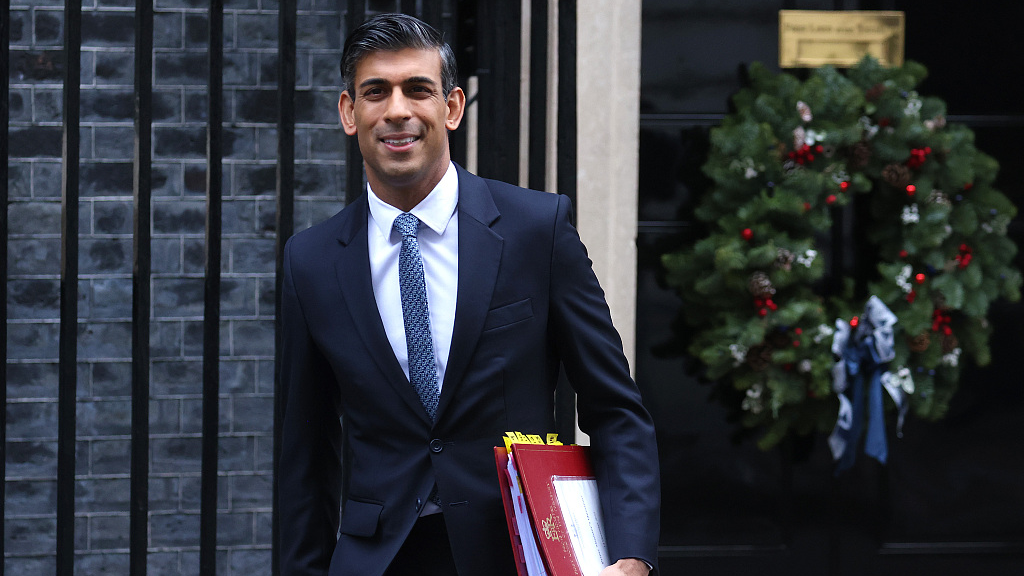 Rishi Sunak leaving No.10 Downing Street ahead of Prime Minister's questions on December 14, 2022 in London, UK. /CFP
