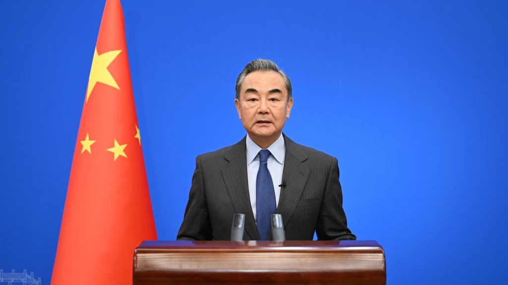 Chinese State Councilor and Foreign Minister Wang Yi, also a member of the Political Bureau of the Communist Party of China Central Committee, addresses a symposium on the international situation and China's foreign relations in 2022 via video link in Beijing, China, December 25, 2022. /Xinhua