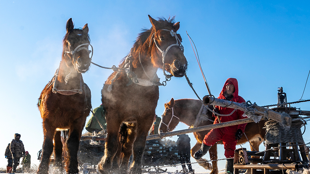 Winter fishing in Chagan Lake, Jilin Province