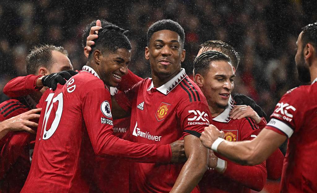 Manchester United players celebrate their first goal during the English Premier League match against Nottingham Forest at Old Trafford in Manchester, UK, December 27, 2022. /CFP