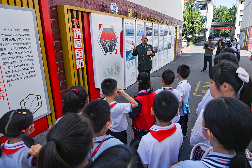 Students from Wenchang School in Qingzhou City, Shandong Province, listen to a lecture at a national defense education base, September 17, 2022. /CFP