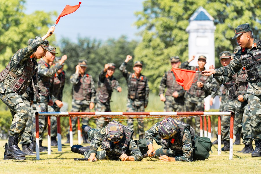 Armed police take part in tactical training in south China's Guangxi Zhuang Autonomous Region, August 1, 2022. /Xinhua