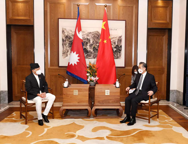 Chinese State Councilor and Foreign Minister Wang Yi held talks with the visiting Nepali Foreign Minister Narayan Khadka in Qingdao, Shandong Province, August 10, 2022./Chinese Foreign Ministry