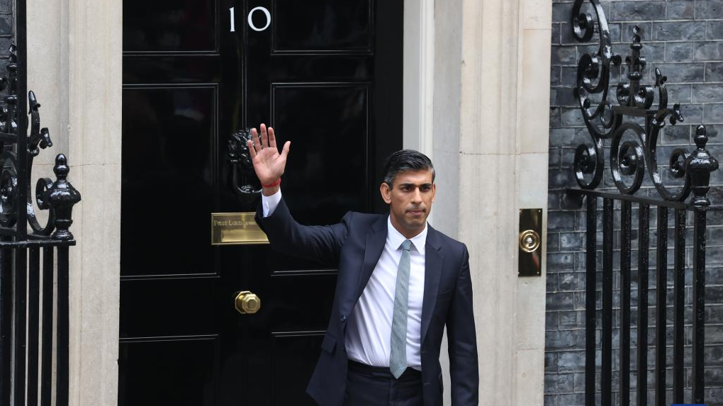 Britain's new Prime Minister Rishi Sunak waves to the crowd after delivering his first address to the nation outside 10 Downing Street in London, Britain, October 25, 2022. /Xinhua
