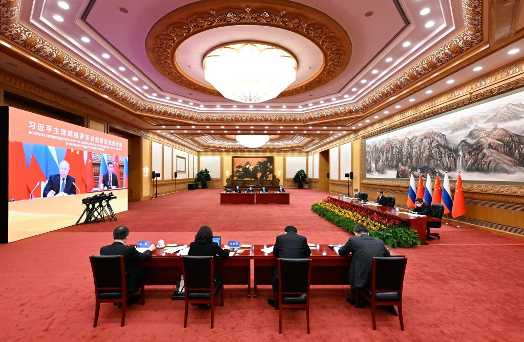 Chinese President Xi Jinping meets with Russian President Vladimir Putin via video link in Beijing, China, December 30, 2022. /Xinhua