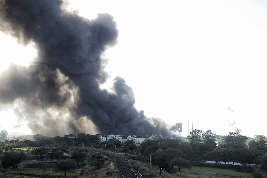 Black smoke rises after a fire breaks out at a factory in Mundegaon village near Igatpuri in Nashik district of Maharashtra state, India, January 1, 2023. /CFP