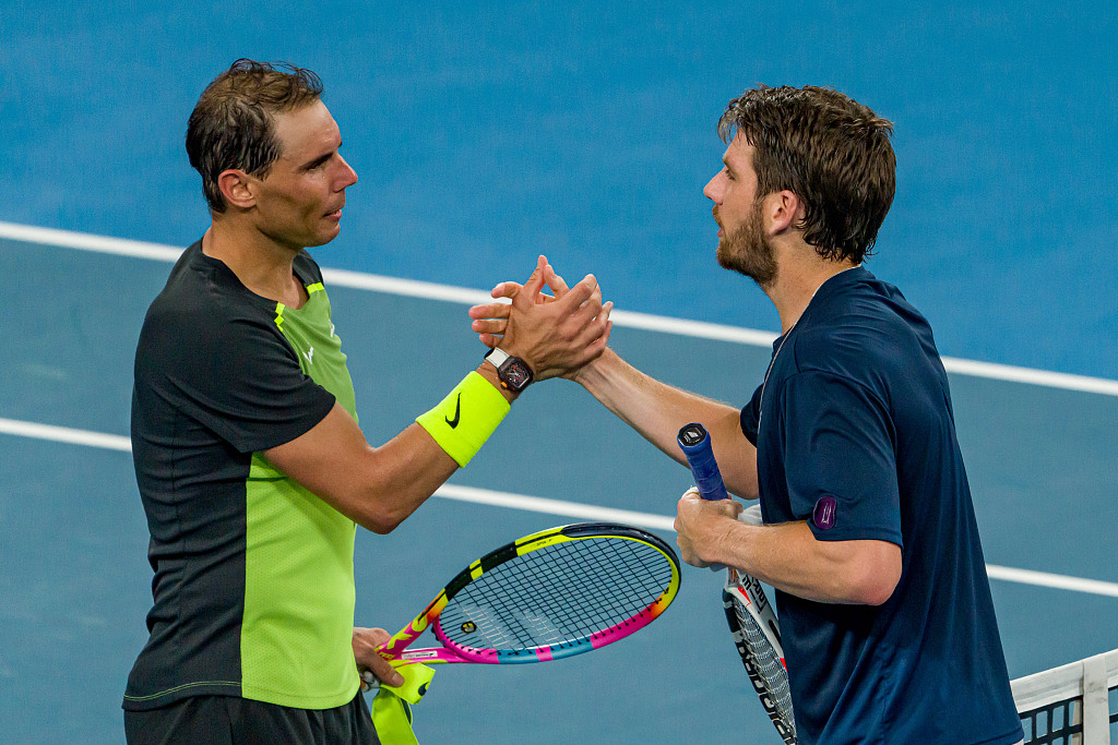 Cameron Norrie (R) of Britain shakes hands with Rafael Nadal of Spain after their match at the United Cup in Sydney, Australia, December 31, 2022. /CFP
