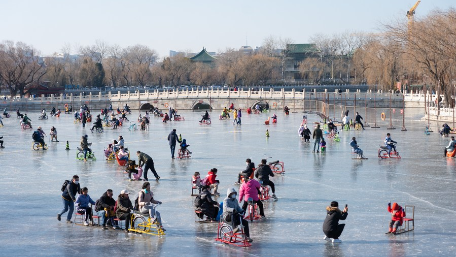 People have fun on the ice rink at Beihai Park in Beijing, China, December 31, 2022. /Xinhua
