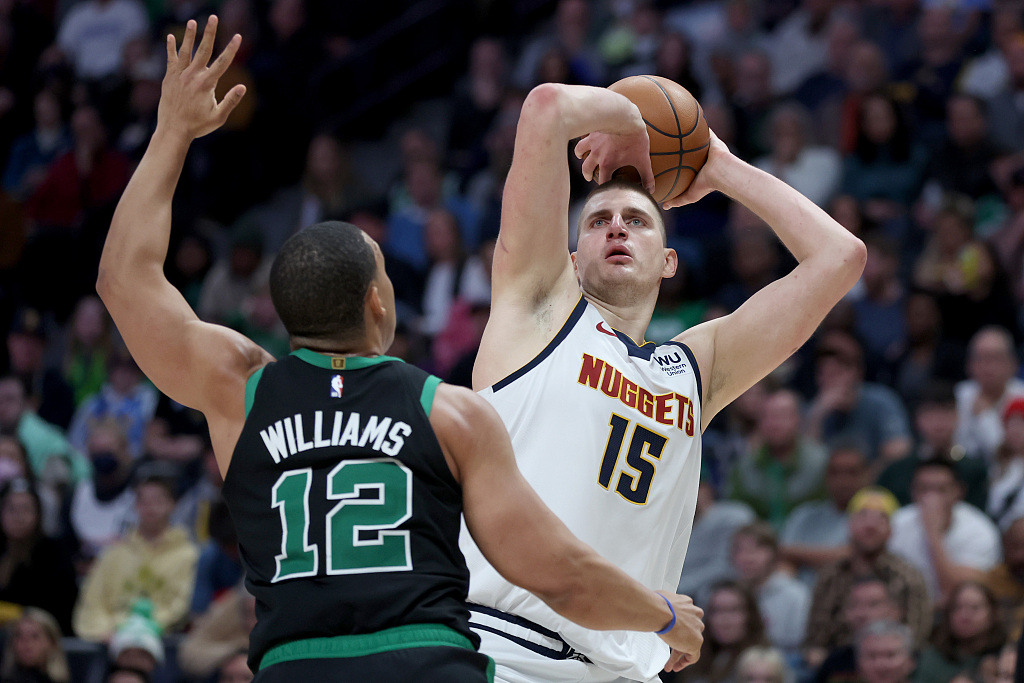 Nikola Jokic (#15) of the Denver Nuggets shoots in the game against the Boston Celtics at Ball Arena in Denver, Colorado, January 1, 2023. /CFP