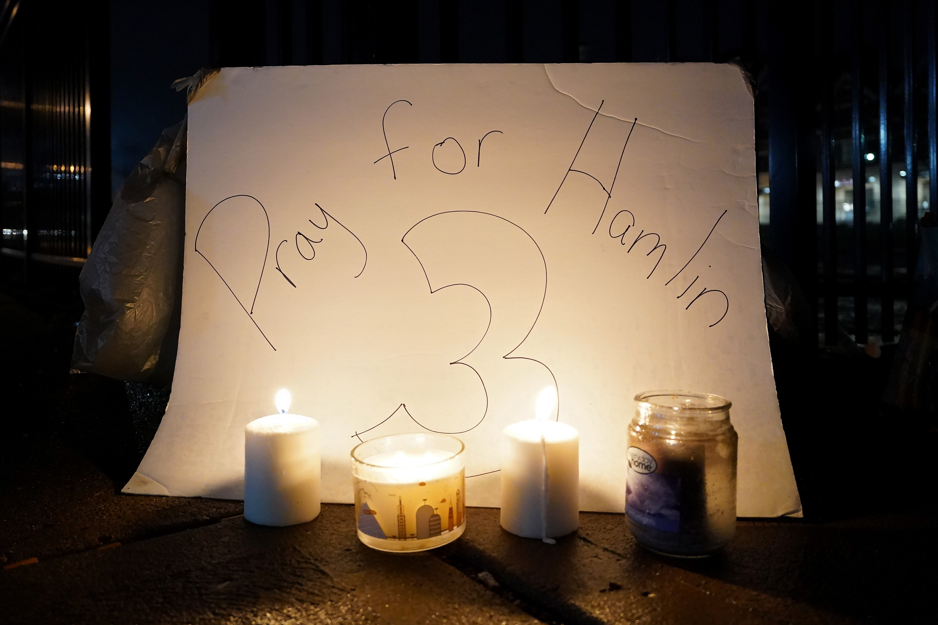 Candles placed at the University of Cincinnati Medical Center for Buffalo Bills safety Damar Hamlin after he collapsed in the game against the Cincinnati Bengals at the Paycor Stadium in Cincinnati, Ohio, January 3, 2023. /CFP
