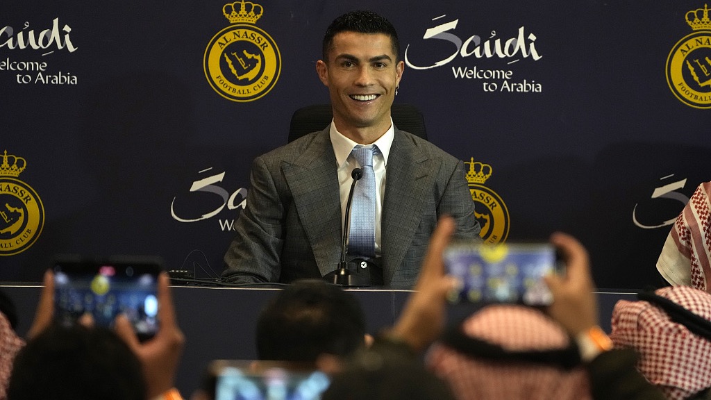 Cristiano Ronaldo smiles during a press conference for his official unveiling as an Al Nassr player in Riyadh, Saudi Arabia, January 3, 2023. /CFP
