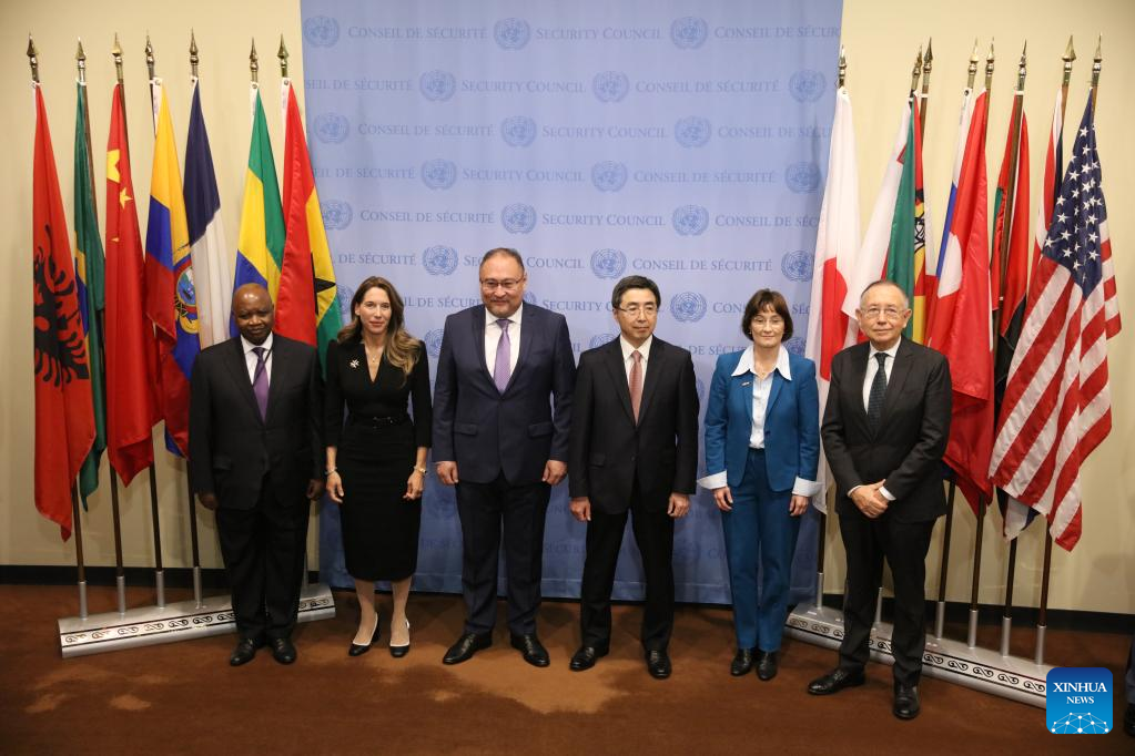 Kazakhstan's permanent representative Akan Rakhmetullin (3rd L) and permanent representatives of the five new UN Security Council members attend a flag installation ceremony at the UN headquarters in New York, U.S., January 3, 2023. /Xinhua