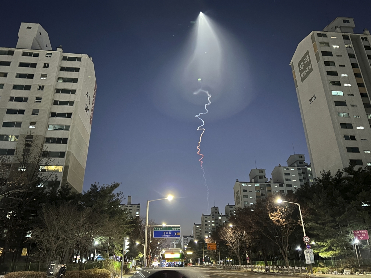 The light trail is seen in Goyang, Republic of Korea (ROK). ROK military confirmed it test-fired a solid-fueled rocket on Friday, after its unannounced launch triggered brief public scare of a Democratic People's Republic of Korea launched missile or drone. Dec. 30, 2022. /AP