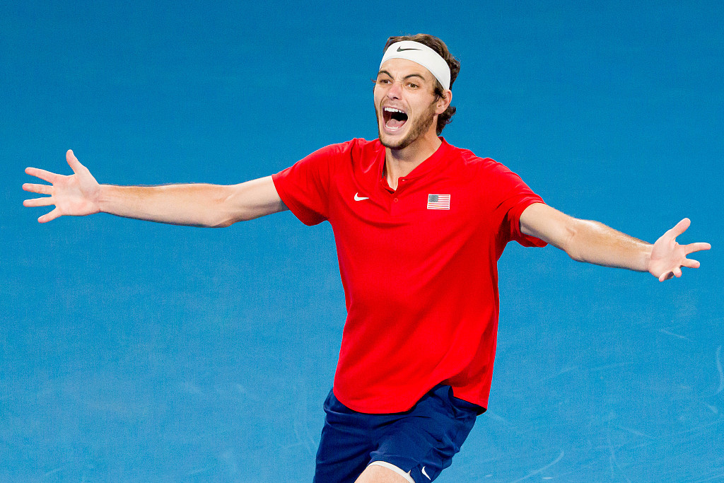 Taylor Fritz of the United States celebrates championship point in his final against Italian Matteo Berrettini at the inaugural United Cup mixed team tournament in Sydney, Australia, January 8, 2023. /CFP
