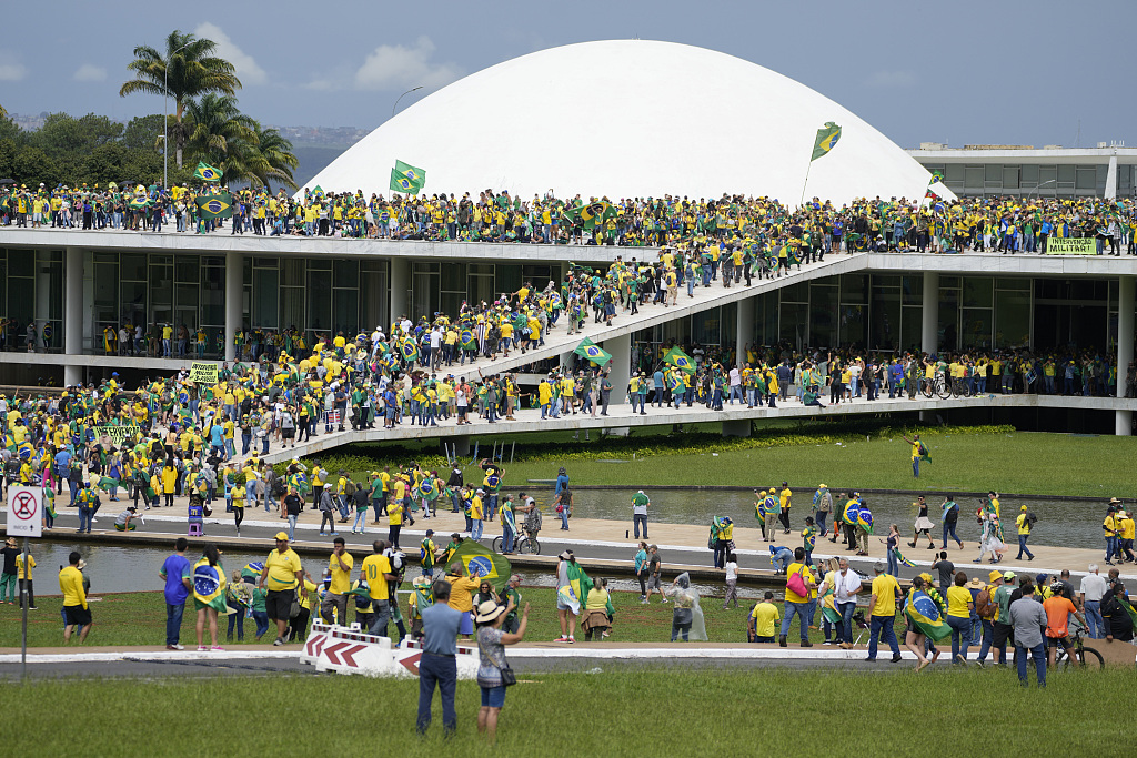 Protesters, supporters of Brazil's former President Jair Bolsonaro, storm the National Congress building in Brasilia, Brazil, January 8, 2023. /CFP