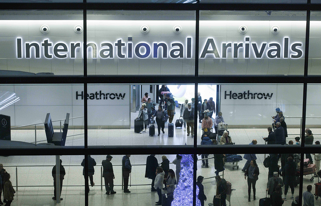 Chinese travellers arrive at Heathrow Airport, London, United Kingdom, January 4, 2023. /CFP