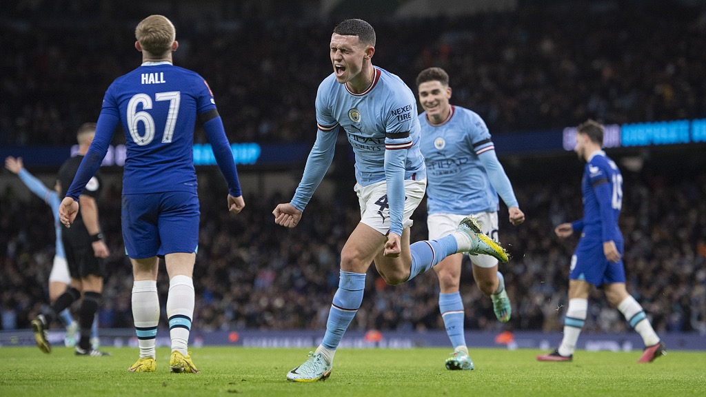 Phil Foden (C) of Manchester City celebrates scoring his goal while Lewis Hall (#67) of Chelsea looks dejected during their FA Cup clash at Etihad Stadium in Manchester, England, January 8, 2023. /CFP