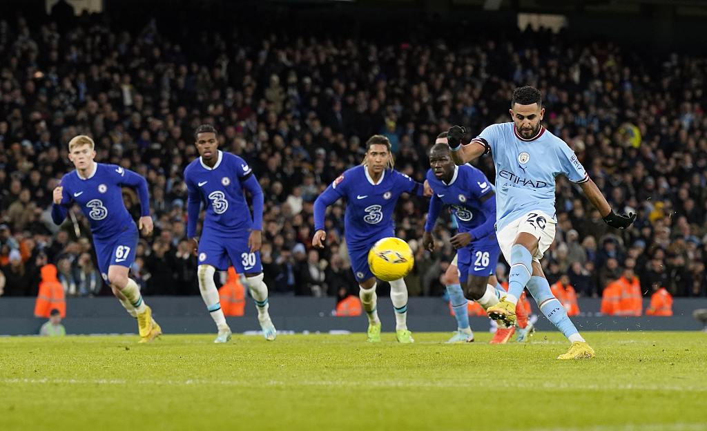 Riyad Mahrez of Manchester City coverts the penalty for their fourth goal during their FA Cup clash with Chelsea at Etihad Stadium in Manchester, England, January 8, 2023. /CFP