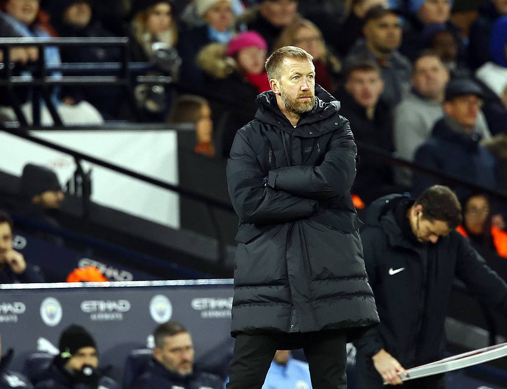 Chelsea manager Graham Potter witnesses his side slide to a heavy defeat at the hands of Manchester City at Etihad Stadium in Manchester, England, January 8, 2023. /CFP