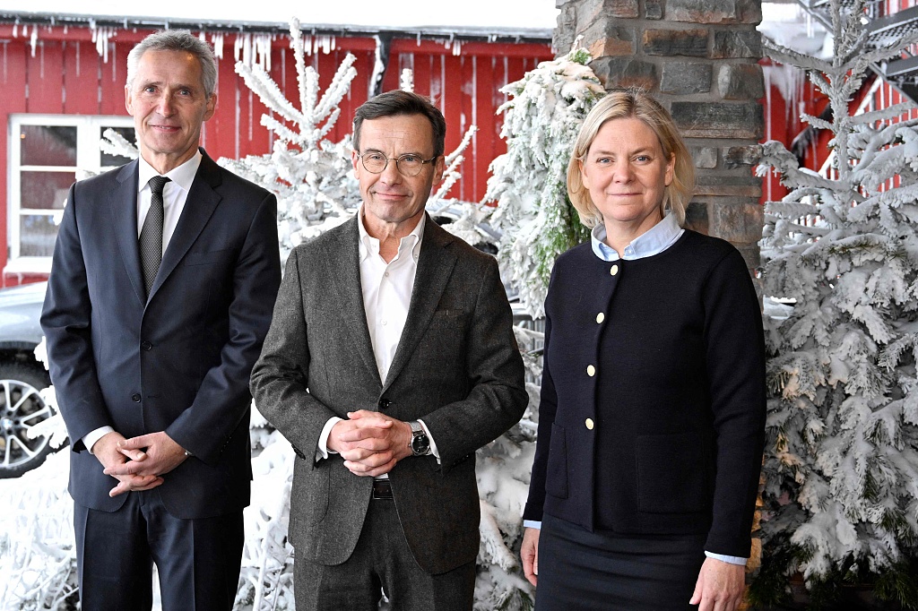 (L to R) NATO Secretary General Jens Stoltenberg, Swedish Prime Minister Ulf Kristersson and Leader of the Swedish Social Democratic Party Magdalena Andersson pose for photos during the annual Society and Defense Conference in Salen, Sweden, January 8, 2023. /CFP
