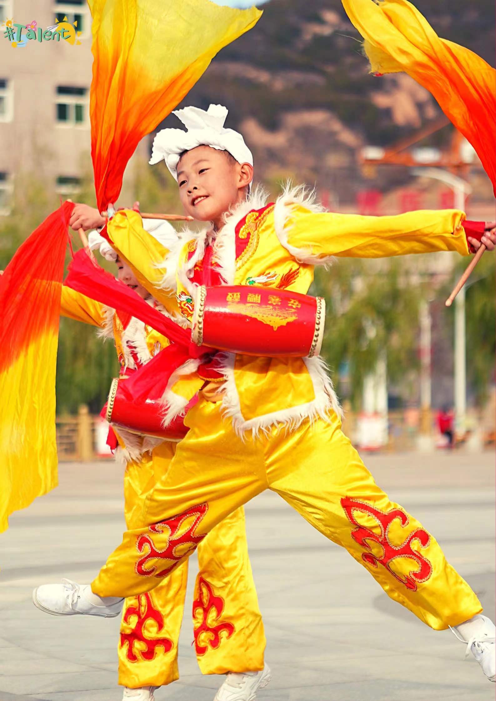 Gao Yuchen jumps during an Ansai waist drum performance. /CGTN