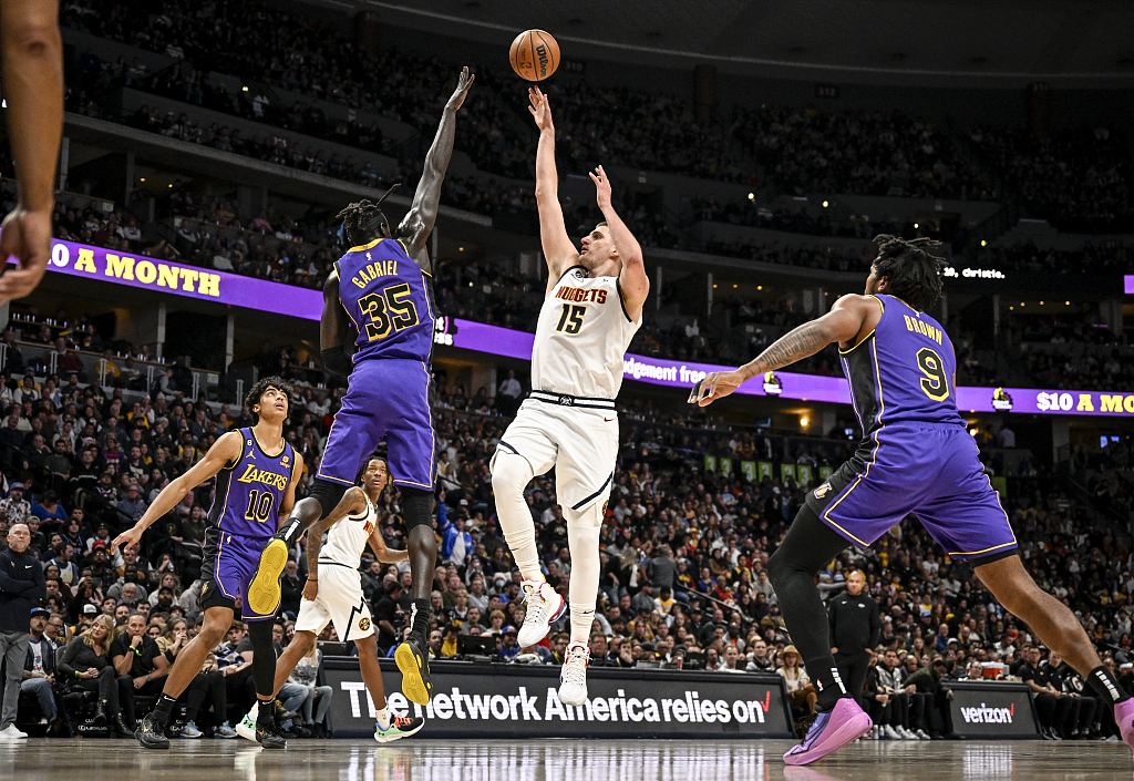 Nikola Jokic (#15) of the Denver Nuggets shoots in the game against the Los Angeles Lakers at Ball Arena in Denver, Colorado, January 9, 2023. /CFP