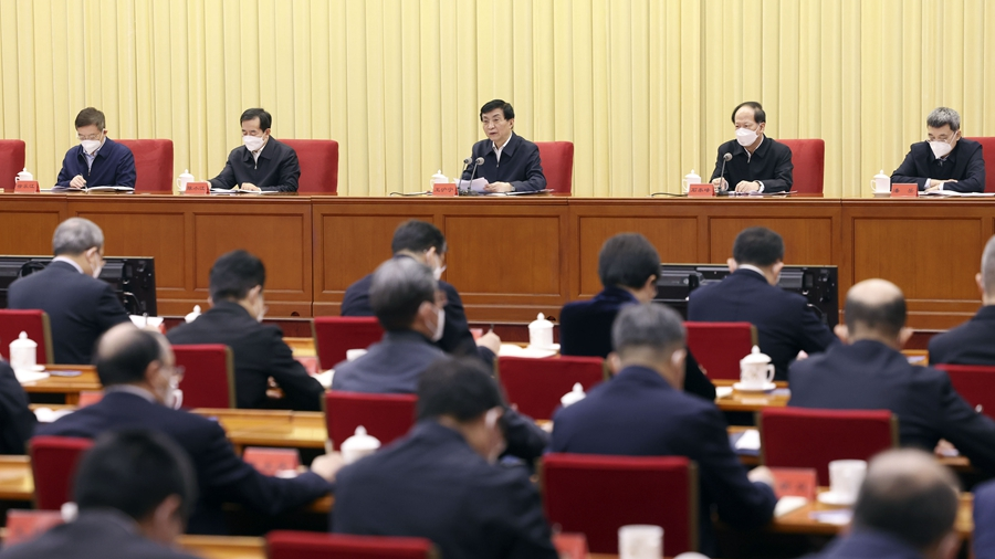 Wang Huning (C), a member of the Standing Committee of the Political Bureau of the CPC Central Committee, speaks at a conference for heads of united front work departments across the country in Beijing, China, January 10, 2023. /Xinhua