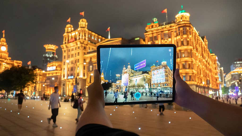 A person using a metaverse-concept application on the Bund in Shanghai, August 30, 2022. /CFP