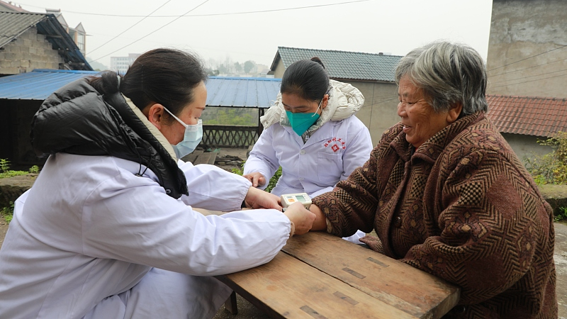 Doctors visit the elderly to provide free health services in China's Sichuan Province, January 11, 2023. /CFP