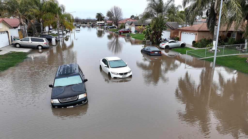 In an aerial view, cars sit in floodwaters on January 11, 2023 in Planada, California, U.S. /VCG