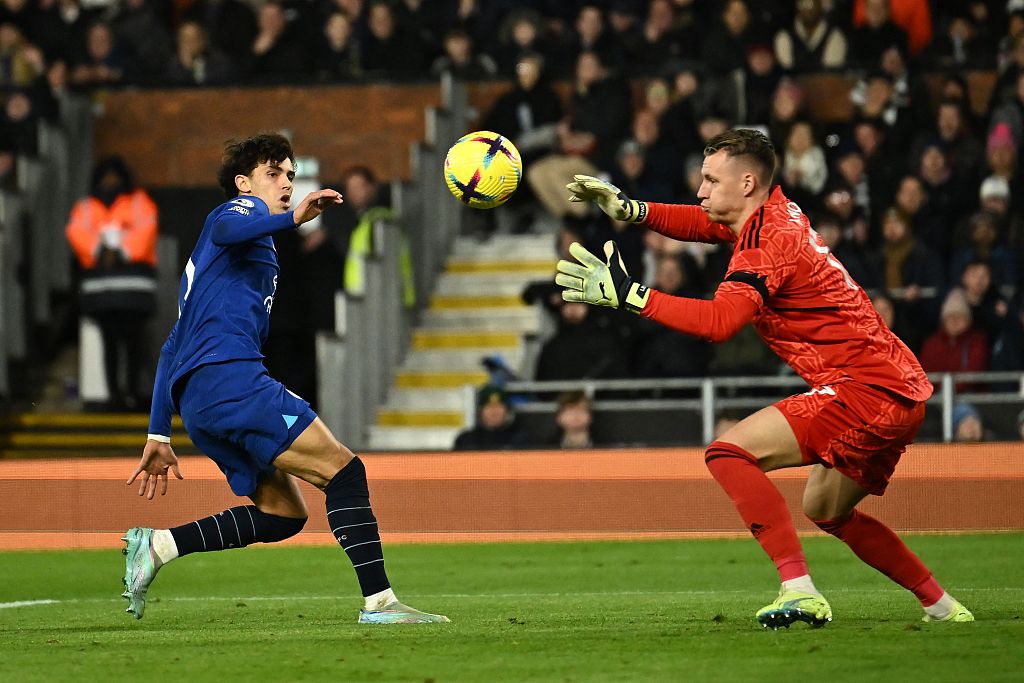Goalkeeper Bernd Leno of Fulham saves an attempt from Joao Felix (L) of Chelsea during their Premier League match at Craven Cottage in London, England, January 12, 2023. /CFP