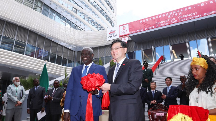 Chinese Foreign Minister Qin Gang (R, front) and Chairperson of the African Union (AU) Commission Moussa Faki Mahamat (L, front) attend a ceremony that marked the completion of the Africa Centers for Disease Control and Prevention (Africa CDC) headquarters project in the southern suburb of Addis Ababa, capital of Ethiopia, January 11, 2023. /Xinhua