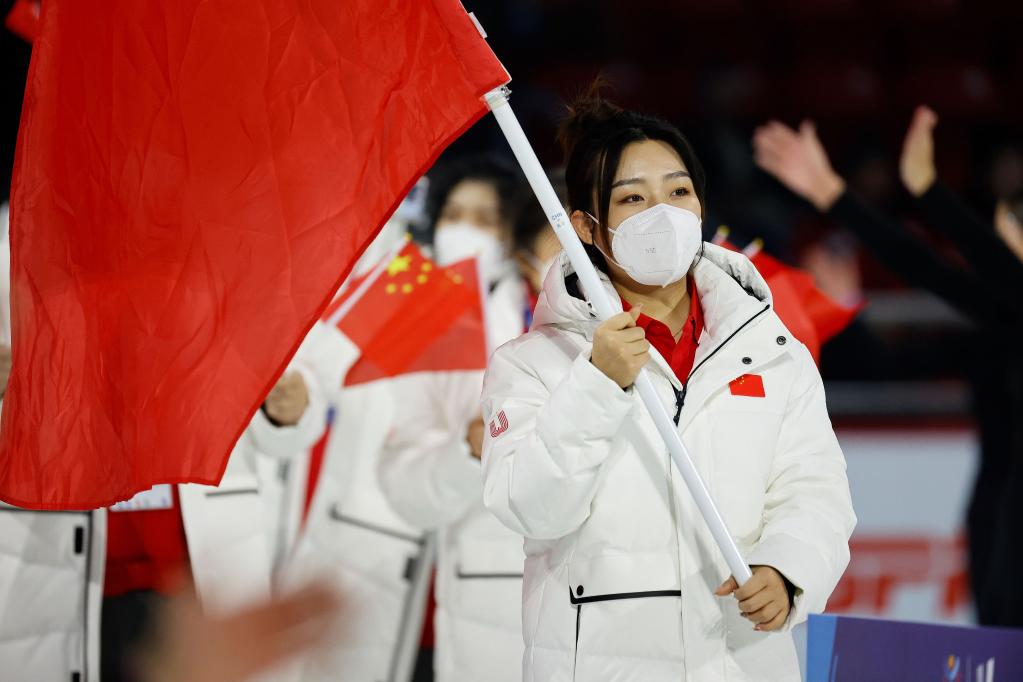 Flag bearer Chinese curler Han Yu during the opening ceremony of the 31st Winter World University Games in Lake Placid, U.S., January 12, 2023. /Xinhua 