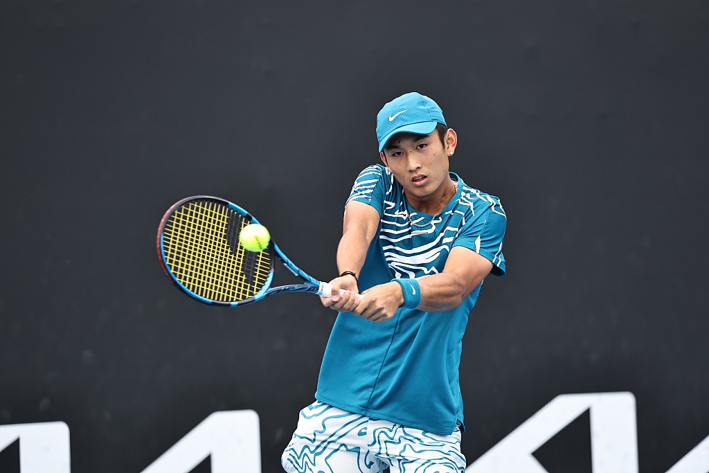 Shang Juncheng of China competes in the men's singles first-round match against Oscar Otte of Germany in the Australian Open at Melbourne Park in Melbourne, Australia, January 16, 2023. /CFP
