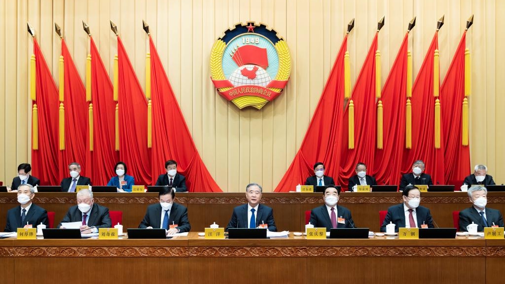 Wang Yang (C), chairman of the 13th CPPCC National Committee, presides over the closing meeting of the 25th session of the Standing Committee of the 13th CPPCC National Committee and delivers a speech in Beijing, China, January 17, 2023. /Xinhua