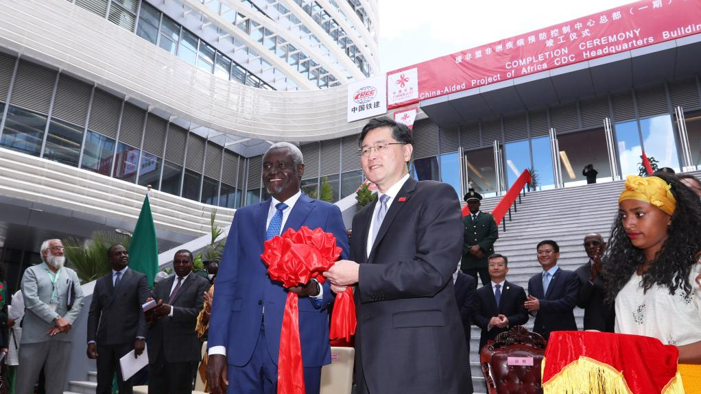 Chinese Foreign Minister Qin Gang (C, front) and Chairperson of the African Union (AU) Commission Moussa Faki Mahamat (L, front) attend a ceremony that marked the completion of the Africa Centers for Disease Control and Prevention headquarters project in the southern suburb of Addis Ababa, capital of Ethiopia on January 11, 2023. /Xinhua