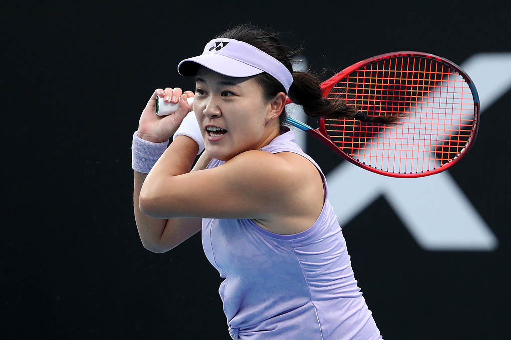 China's Zhu Lin plays a backhand in the round two singles match against Jil Teichmann of Switzerland at the Australian Open in Melbourne, Australia, January 18, 2023. /CFP 