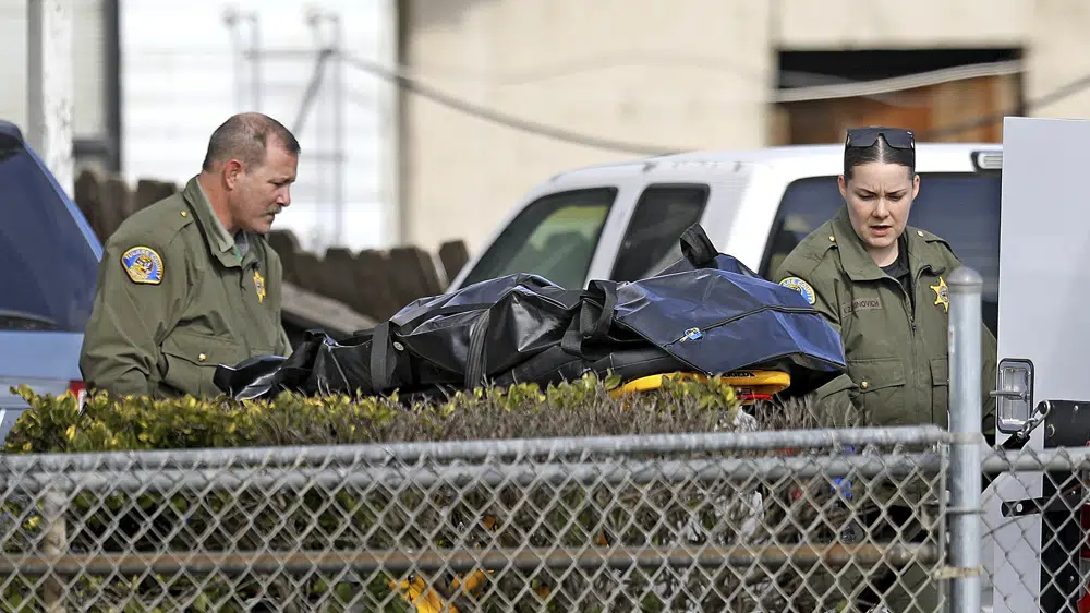 The Tulare County Sheriff crime unit removes the body of one of the victims at the scene of a shooting in Goshen, California, January 16, 2023. /AP