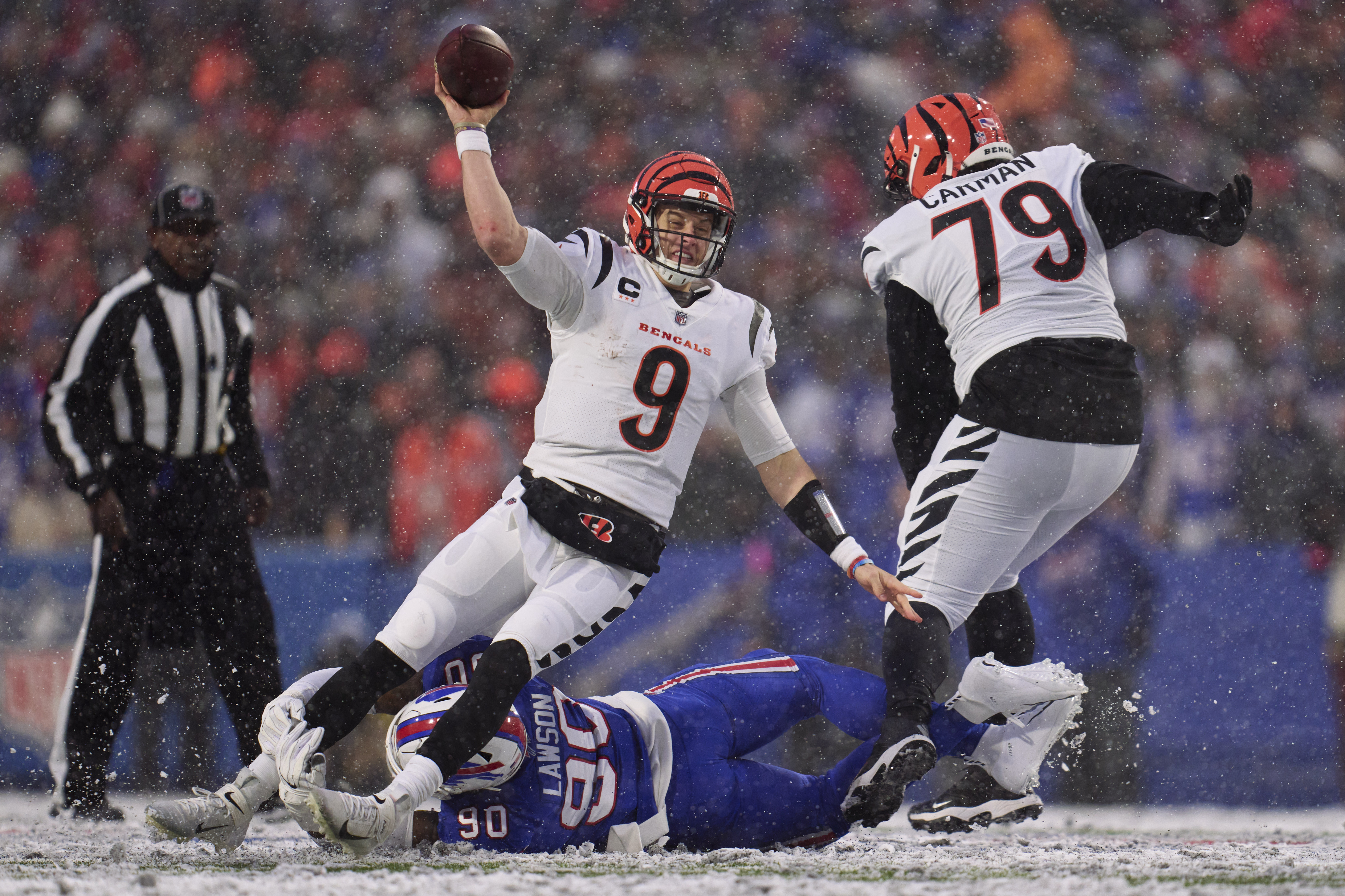 Quarterback Joe Burrow (#9) of the Cincinnati Bengals passes in the NFL American Football Conference Divisional Round game against the Buffalo Bills at Highmark Stadium in Orchard, New York, January 22, 2023. /CFP