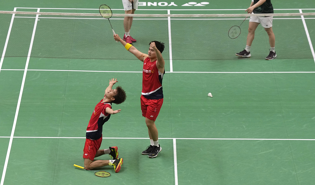 China's Liang Wei Keng and Wang Chang defeat Malaysia's Aaron Chia and Son Wood Yik in the men's doubles at the India Open 2023 in New Delhi, January 22, 2023. /CFP